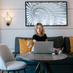 Confident tech CEO presenting AI-native brand strategy in futuristic 2026 office with holographic displays – how to be confident with your tech brand